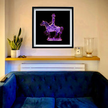 Load image into Gallery viewer, Purple Cowboy pop art photographic print framed in black by Natasha Heidler on the living room wall