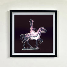Load image into Gallery viewer, Cowboy on a horse pop art photographic print framed in black by Natasha Heidler