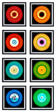 Load image into Gallery viewer, Photograph by Heidler and Heeps. Eight colourful vinyl records in black frames sit vertically, 2 x 4.