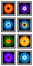 Load image into Gallery viewer, Photograph by Heidler and Heeps. Eight colourful vinyl records in black frames sit vertically, 2 x 4.