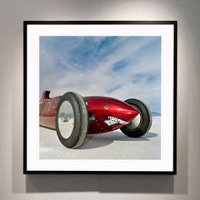 Load image into Gallery viewer, Black framed photograph by Richard Heeps.  The side on front of a red belly tank racing car, it is designed as a shark eating a $100 bill.