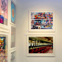 Load image into Gallery viewer, White framed photographs by Richard Heeps. A display of Richard's photographs at the Affordable Art Show.