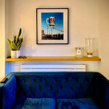 Load image into Gallery viewer, In situ photograph by Richard Heeps. A giant model of a mug with Bob's Root Beer written on it sits on top of a giant pole. There is bunting hanging from the pole. It sits alongside a power line on a remote looking American country road.