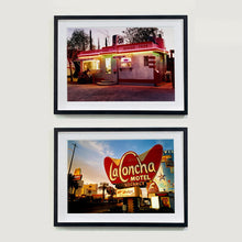 Load image into Gallery viewer, Two Black framed photographs by Richard Heeps. The top one depicts a one storey small building "Dot's Diner" brightly lit with a pink roof, with Hamburgers, Hot Dogs, Shakes, Fries written along the top of the building. The bottom photograph is the outside of LaConcha Motel which is written in a big red sign with golden writing, below the sign is VACANCY written in red, below this sits a sign for Budget rent a car.