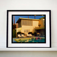 Load image into Gallery viewer, Black framed photograph by Richard Heeps. Palm Springs Poolside, classic mid-century Palm Springs architecture, featuring cool blue skies and pool.
