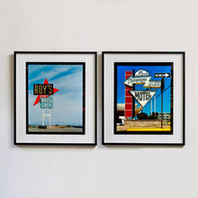 Load image into Gallery viewer, Two black framed photographs by Richard Heeps edged by film rebate. On the left hand side a Route 66 roadside sign. For ROY's MOTEL and CAFE ROY'S. On the right hand side, is a photo of a white sign in the shape of an arrow with Champagne written on it and a white cloud sign above with the word Pink written, at the bottom is a white arrow pointing down with the word MOTEL written. There is also a red block sign on the left hand side and a ONE WAY sign on the right hand side.