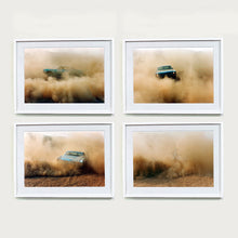 Load image into Gallery viewer, Four white framed photographs by Richard Heeps. The four photographs are of a light blue Buick car moving and slightly obscured by the dust clouds which it has created. The car is sideways on in the first photograph, head on in the second, its back in the third and can hardly been seen in the fourth photograph.