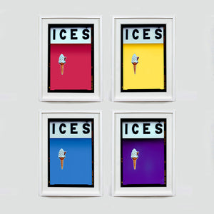Set of four (2x2) white framed photographs by Richard Heeps.  Four identical photographs (apart from the block colour), at the top black letters spell out ICES and below is depicted a 99 icecream cone sitting left of centre set against, in turn, a raspberry, sherbert yellow, baby blue and purple coloured background.  