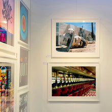 Load image into Gallery viewer, White framed photographs by Richard Heeps hung on the walls at the Affordable Art Exhibition at Battersea, UK