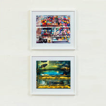 Load image into Gallery viewer, Two white framed photographs by Richard Heeps. The top photograph is of three compartmentalised shop shelves, each compartment has coloured plastic dice, counters, circular containers, cards, poker chips, and other plastic type games items. The bottom photograph is exotic fish in a wet market in Kowloon.