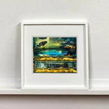Load image into Gallery viewer, White mounted photograph by Richard Heeps. Wet market fish tank filled with blue green and yellow fish, in a Hong Kong street.