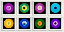 Load image into Gallery viewer, Photograph by Heidler and Heeps. Eight colourful vinyl records in white frames sit horizontally, 2 x 4.