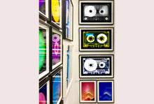 Load image into Gallery viewer, Tape Collection, 'AILA Tinted Yellow'. The Heidler & Heeps collaborations are creative representations of Natasha Heidler and Richard Heeps’ personal past, and their personalities. Tapes are significant in both their lives and the work here is made from their own collections. Their unique process makes these artworks not inanimate objects, rather they have depth, texture, grit, and they even appear to move.