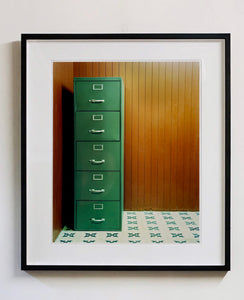 This green filing cabinet stands in the corner of a mid-century wood panelled bunker office. This interior artwork was photographed in Ho Chi Minh City, and is part of Richard's series 'This is not America'.