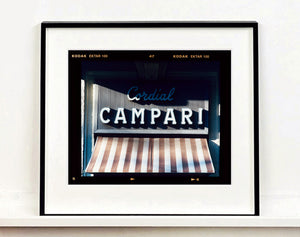Cordial Campari, photographed as part of Richard Heeps’ series 'A Short History of Milan’ features beautiful and bold typography above the striped awning of a fascist building. 