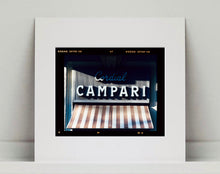 Load image into Gallery viewer, Cordial Campari, photographed as part of Richard Heeps’ series 'A Short History of Milan’ features beautiful and bold typography above the striped awning of a fascist building.