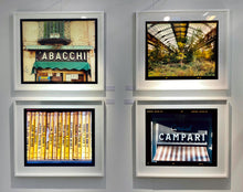 Load image into Gallery viewer, Cordial Campari, photographed as part of Richard Heeps’ series 'A Short History of Milan’ features beautiful and bold typography above the striped awning of a fascist building.