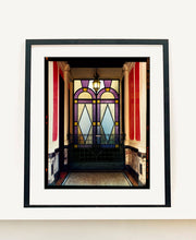Load image into Gallery viewer, 'Foyer VII' shows an Art Deco entrance hall in Milan, featuring stained glass panelling and marble flooring. This artwork is part of Richard Heeps' series 'A Short History of Milan', which began in November 2018 for a special project featuring at the Affordable Art Fair Milan 2019, and the series is ongoing. There is a reoccurring linear, structural theme throughout the series, capturing the Milanese use of materials in design such as glass, metal, wood and stone.