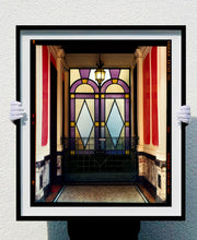Load image into Gallery viewer, 'Foyer VII' shows an Art Deco entrance hall in Milan, featuring stained glass panelling and marble flooring. This artwork is part of Richard Heeps' series 'A Short History of Milan', which began in November 2018 for a special project featuring at the Affordable Art Fair Milan 2019, and the series is ongoing. There is a reoccurring linear, structural theme throughout the series, capturing the Milanese use of materials in design such as glass, metal, wood and stone.