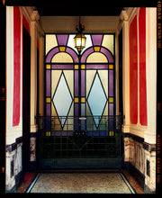 Load image into Gallery viewer, 'Foyer VII' shows an Art Deco entrance hall in Milan, featuring stained glass panelling and marble flooring. This artwork is part of Richard Heeps' series 'A Short History of Milan', which began in November 2018 for a special project featuring at the Affordable Art Fair Milan 2019, and the series is ongoing. There is a reoccurring linear, structural theme throughout the series, capturing the Milanese use of materials in design such as glass, metal, wood and stone.