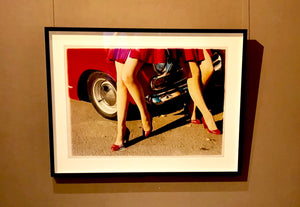 'Glamour Cabs', photographed by Richard Heeps at the glamorous retro event Goodwood Revival. It perfectly captures elegant feminine sophistication with a vintage vibe, a nod to the film Carry on Cabbie. This artwork featured in Richard Heeps' 2018-2019 exhibition WEMEN, at Nhow Hotel Milan.