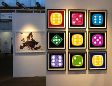 Load image into Gallery viewer, From Heidler & Heeps Dice Series, a yellow dice suspended on an inky blue background.