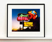 Load image into Gallery viewer, 'Lariat Motel' is a classic Richard Heeps Americana 'Sign Porn' artwork. It was captured in its original site in Fallon, Nevada. The owners since sold the Lariat Motel and donated the 1950's sign with original neon tubing to the Churchill Arts Council. This photograph forms part of Richard Heeps' 'Dream in Colour' series.
