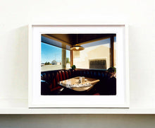 Load image into Gallery viewer, 'Nicely's Cafe' taken in Mono Lake, California, is a cinematic and classic American Diner scene photographed by Richard Heeps for his 'Dream in Colour' series. "I was driving between Death Valley and Fallon when I stopped at this Diner for a coffee. The light was perfect."
