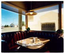 Load image into Gallery viewer, 'Nicely's Cafe' taken in Mono Lake, California, is a cinematic and classic American Diner scene photographed by Richard Heeps for his 'Dream in Colour' series. "I was driving between Death Valley and Fallon when I stopped at this Diner for a coffee. The light was perfect."