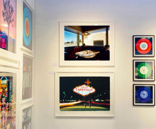 Load image into Gallery viewer, 'Nicely's Cafe' taken in Mono Lake, California, is a cinematic and classic American Diner scene photographed by Richard Heeps for his 'Dream in Colour' series. "I was driving between Death Valley and Fallon when I stopped at this Diner for a coffee. The light was perfect."