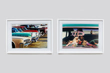 Load image into Gallery viewer, 'Oldsmobile & Sinful Barbie's' photographed in, Las Vegas, Nevada, is part of Richard Heeps 'Man's Ruin' Series. This artwork makes up the three piece sequence: 'Wendy Flamin' Eyeball', 'Wendy Resting' & 'Oldsmobile and Sinful Barbie's' shot at the Rockabilly Weekender, Viva Las Vegas. Here this is a brilliantly adult version of the iconic Barbie Doll on the dashboard of a classic American Car.
