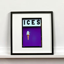Load image into Gallery viewer, Black framed photograph by Richard Heeps.  At the top black letters spell out ICES and below is depicted a 99 icecream cone sitting left of centre against a purple coloured background.  