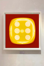 Load image into Gallery viewer, From Heidler & Heeps Dice Series, a yellow dice suspended on a red background.