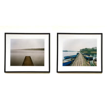 Load image into Gallery viewer, Two framed landscape photographs displayed side by side on a white wall. Norfolk Broads waterscape prints by Richard Heeps.