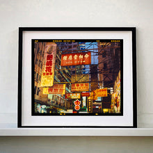 Load image into Gallery viewer, Best Choice in Downtown, Hong Kong cityscape skyline architecture street photography by Richard Heeps framed in black.