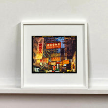 Load image into Gallery viewer, Best Choice in Downtown, Hong Kong cityscape skyline architecture street photography by Richard Heeps mounted square framed in white.