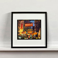 Load image into Gallery viewer, Best Choice in Downtown, Hong Kong cityscape skyline architecture street photography by Richard Heeps mounted square framed in black.