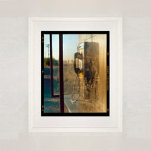 Load image into Gallery viewer, Call Box, cinematic vintage telephone booth road trip mounted photograph in a white frame from Richard Heeps Salton Sea series.