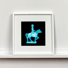 Load image into Gallery viewer, Cowboy on a horse blue pop art small photographic print framed in white by Natasha Heidler