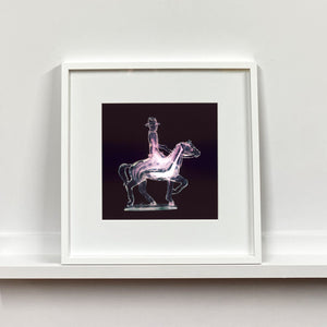 Cowboy on a horse pop art small photographic print framed in white by Natasha Heidler