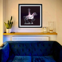 Load image into Gallery viewer, Cowboy on a horse pop art photographic print framed in black on the living room wall by Natasha Heidler