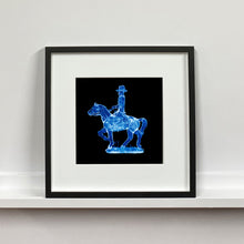 Load image into Gallery viewer, Cowboy on a horse blue pop art small black frame photograph by Natasha Heidler.