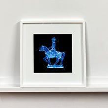 Load image into Gallery viewer, Cowboy on a horse blue pop art small white frame photograph by Natasha Heidler.