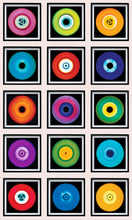 Load image into Gallery viewer, Photograph by Heidler and Heeps. A set of 15 colourful vinyls in black frames. They are sitting vertically in a 3 x 5 formation.