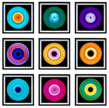 Load image into Gallery viewer, Photograph by Heidler and Heeps. Nine colourful vinyl records appearing in a 3 x 3 format.
