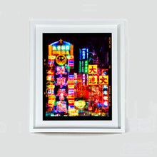 Load image into Gallery viewer, Lights of Mong Kok Hong Kong architecture street photography by Richard Heeps framed in white.