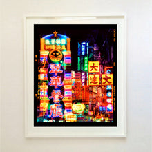 Load image into Gallery viewer, Lights of Mong Kok Hong Kong architecture street large photograph by Richard Heeps framed in white.