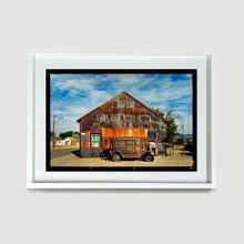 Load image into Gallery viewer, Model T and Garage American road trip colour Kodak Film photograph by Richard Heeps small framed in white