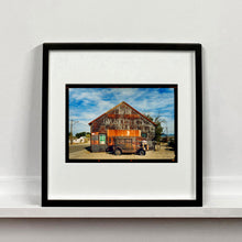 Load image into Gallery viewer, Model T and Garage American road trip colour Kodak Film photograph by Richard Heeps mounted square framed in black