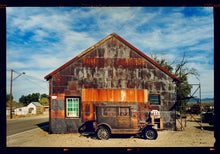 Load image into Gallery viewer, Model T and Garage American road trip colour Kodak Film photograph by Richard Heeps
